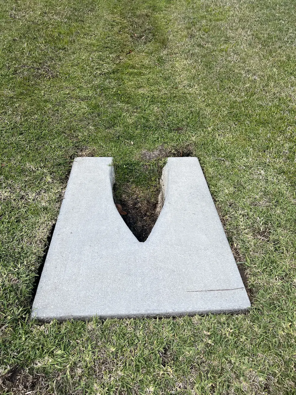 Concrete culvert restored to white after cleaning in Manatee County